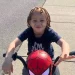 A three-year-old toddler was tragically shot dead while playing with his tricycle during a family graduation party in Buffalo. Ramone Carter was riding his tricycle on Friday night with his 7-year-old sister Jamiah when both were shot at the family gathering. They were rushed to the hospital, but Ramone sadly succumbed to his injuries. Family members and anti-violence organizations gathered on Saturday to honor the young life lost. Martina Carter, Ramone's sister, expressed her disbelief: "I know we’ve been through a lot of tragedies, but I would have never thought a three-year-old baby playing outside at a graduation party would be in a misfire, shot and killed." Ramone's family described him as playful and joyful. Martina added, "He loved the Buffalo Bills. He always talked about wanting to play football." Carlanda Meadors, the communications director of Most Valuable Parents (MVP), said the situation deeply affected those active in the community. MVP is a Buffalo-based outreach organization that addresses local issues with the goal of making the city safer. She said, "Anytime someone is gunned down in the streets of Buffalo, it hits home because we advocate against guns. We need to get these guns off the streets. Violence hurts, no matter who it is.” During a press conference on the incident, Buffalo Common Council President Christopher Scanlon said, "I’m heartbroken for this mother who’s out here every day for our community, and now she loses a three-year-old child. So please, I’m just begging people to cut it out." Police are working diligently to seek justice for the grieving family. Anyone with information is asked to text or call Buffalo police’s confidential tip line at (716) 847-2255. Erie County District Attorney Michael Keane stated, "There are just way too many illegal guns on the street and this three-year-old was on his tricycle when he was shot. It’s outrageous." So far, two people have been interviewed and released, but police need more information from the community. Buffalo Police Commissioner Joseph Gramaglia emphasized, "We are talking about a three-year-old baby who didn’t see his fourth birthday. We need your help to clear this case." In a related tragic incident, a young mother of two was shot dead by her brother during a dispute over Christmas presents. Abrielle Baldwin, 23, was killed on Christmas Eve at their grandmother's house in Largo, Florida. Police suspect her 14-year-old brother Damarcus Coley as the shooter. In a shocking turn of events, Damarcus was then shot by their 15-year-old sibling, Darcus, who fled and called their mother after the incident.
