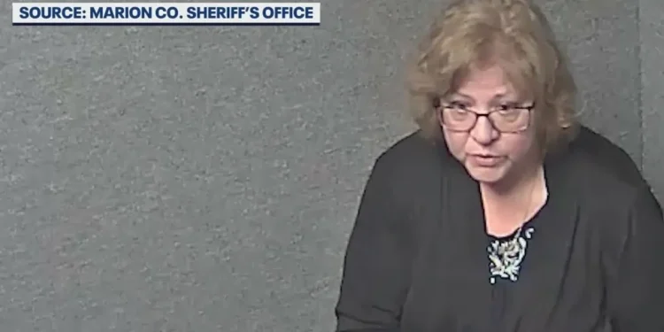 The Florida Sheriff's Office Shares Video Of A Woman Interrogated For Shooting Her Neighbor Dead Through A Door