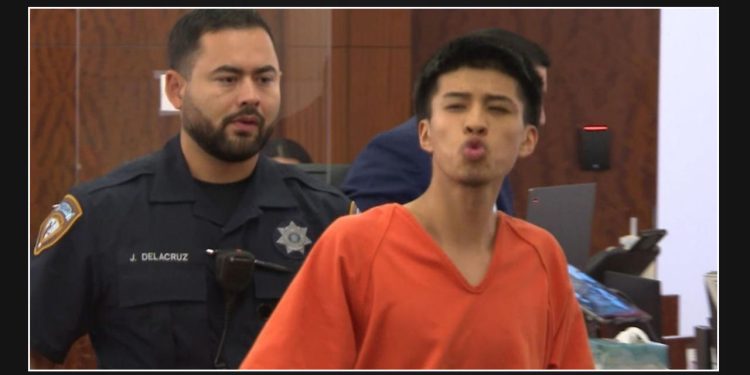 Teenager accused of murder sends air kisses in court