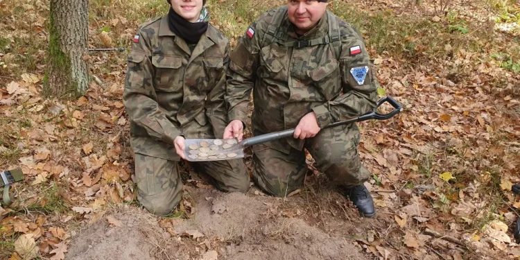 Father and Son Discover Rare Trove of 16th- and 17th-Century Silver Coins While Metal Detecting in a Polish Forest