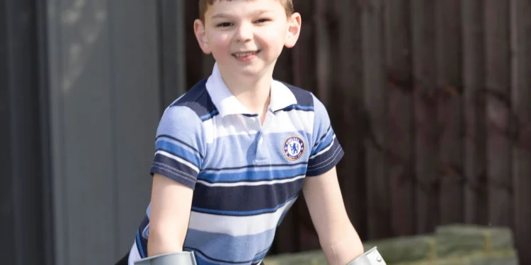 Boy, 10, has ‘miracle’ surgery to help him walk after losing legs due to horrific abuse by parents