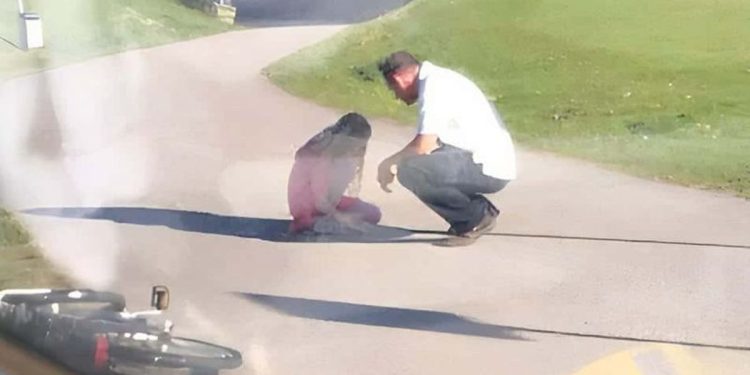 Bus driver sees girl crying in the street — he stops to comfort her after finding out she'd been bullied