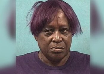 Caregiver locks child in animal enclosure for hours, kicks her, and denies bathroom access as punishment for school behavior; charges filed