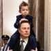 Elon Musk's four-year-old son looks like his mini-me twin as he arrives at Capitol Hill on his dad's shoulders