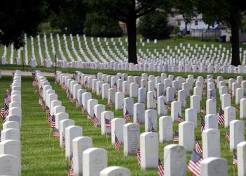Graves decorated at Jefferson Barracks Cemetery