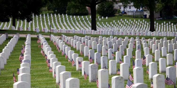 Graves decorated at Jefferson Barracks Cemetery