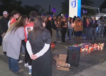 'She was so afraid of him' Vigil held for mother of 3 allegedly beaten to death by estranged husband in motel room