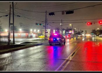 Two teenagers, aged 16, taken into custody and accused of killing a woman at a convenience store