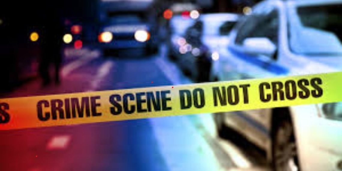 A man died after being shot in the head while inside a running car in