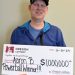 Oregon man who fought two kinds of cancer claims $1 million Powerball prize